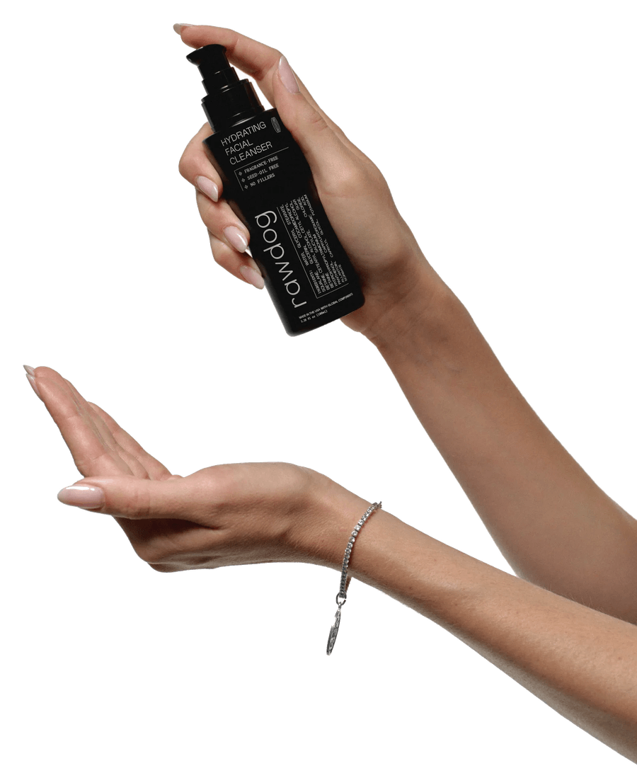 RAWDOG hydrating facial cleanser held above an open hand